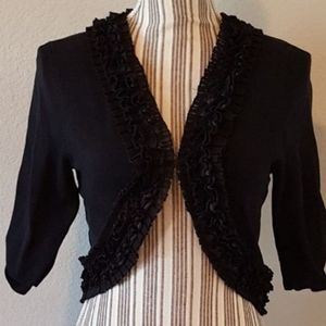 Beautiful vintage, romantic looking 3/4 sleeve blazer with ruffle hem
